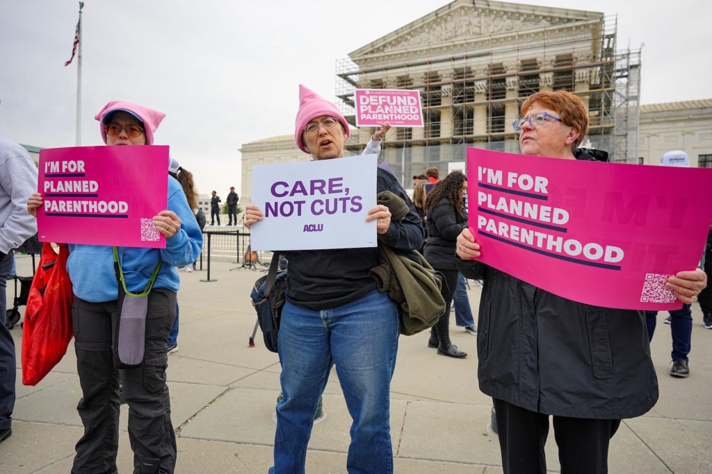 Activists for and against Planned Parenthood demonstrate in front of the U.S. Supreme Court